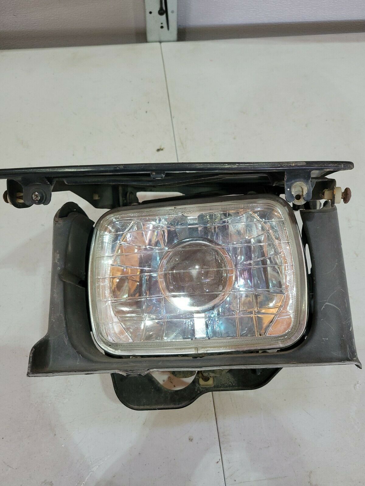 1987 MAZDA RX7 FC left driver headlight